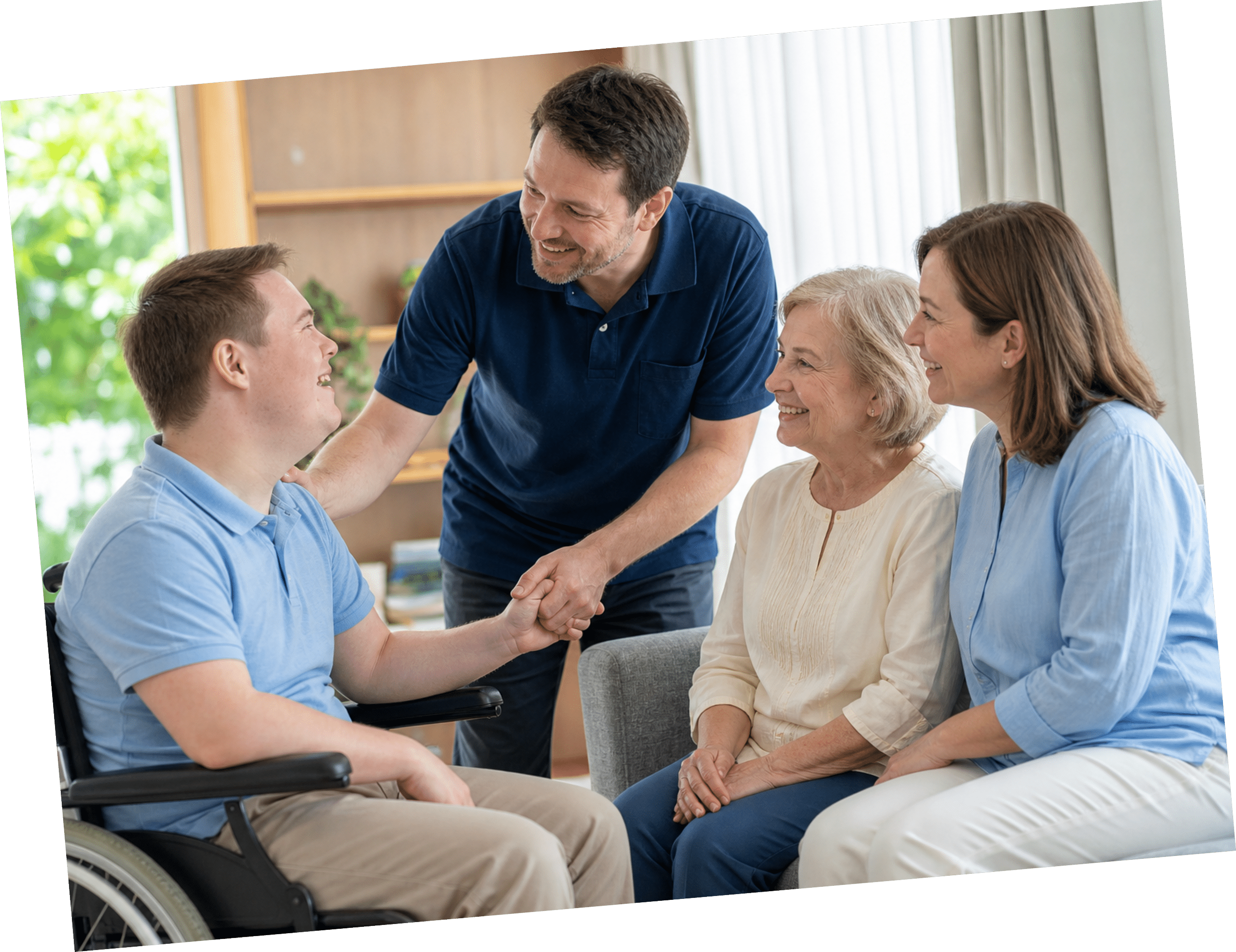 Individual spending time with family and support staff