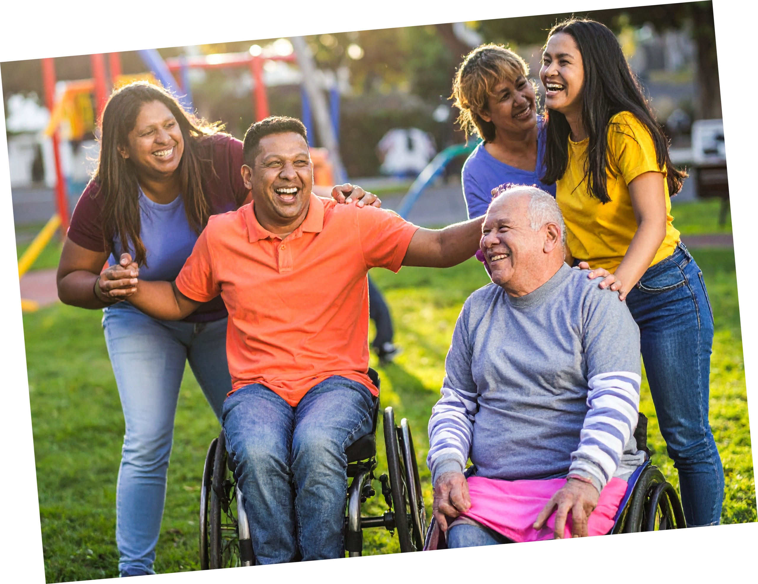 Individuals and support staff enjoying time together outdoors